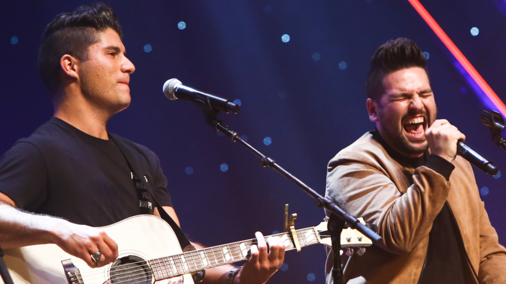 Dan + Shay performing at event 