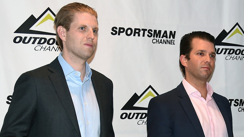 Eric Trump and Donald Trump Jr. standing