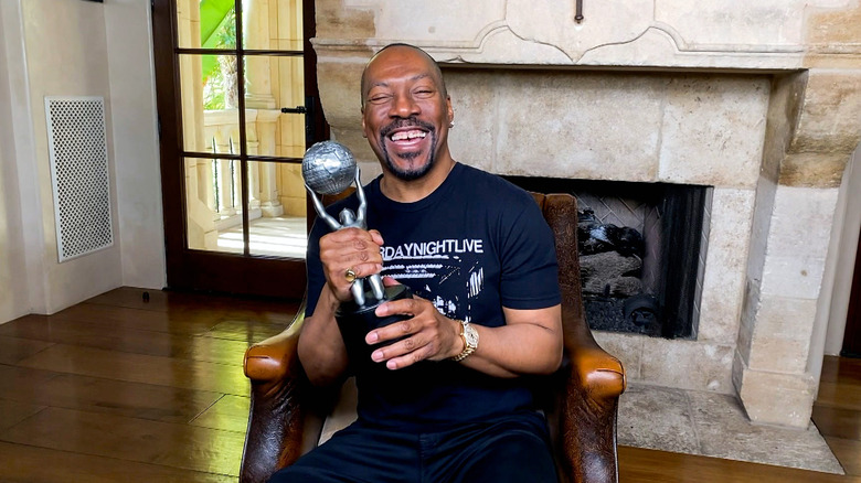 Eddie Murphy receiving a lifetime achievement award in 2021