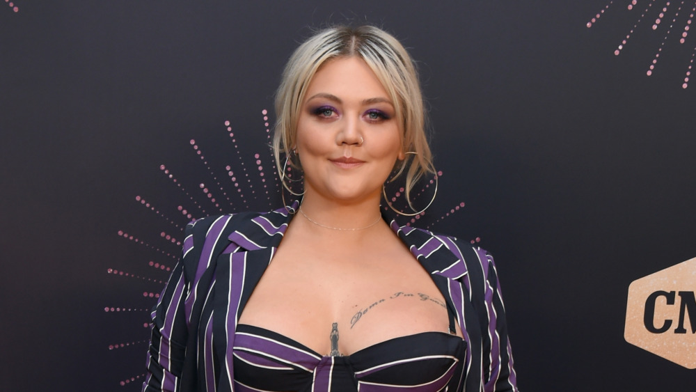 Elle King smiling on the red carpet