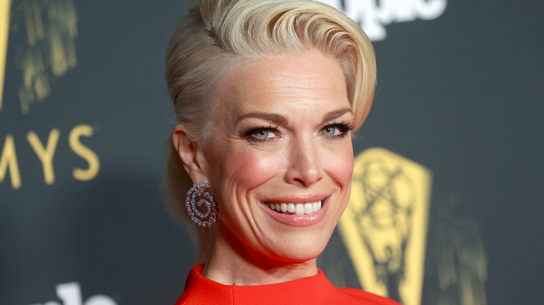 Hannah Waddingham wearing swirl-shaped earrings