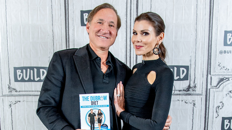 Terry Dubrow and Heather Dubrow posing