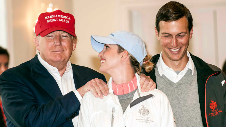 Donald and Ivanka smiling with Jared Kushner