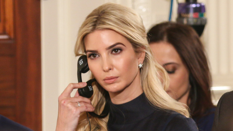 Ivanka Trump listening to headphones 