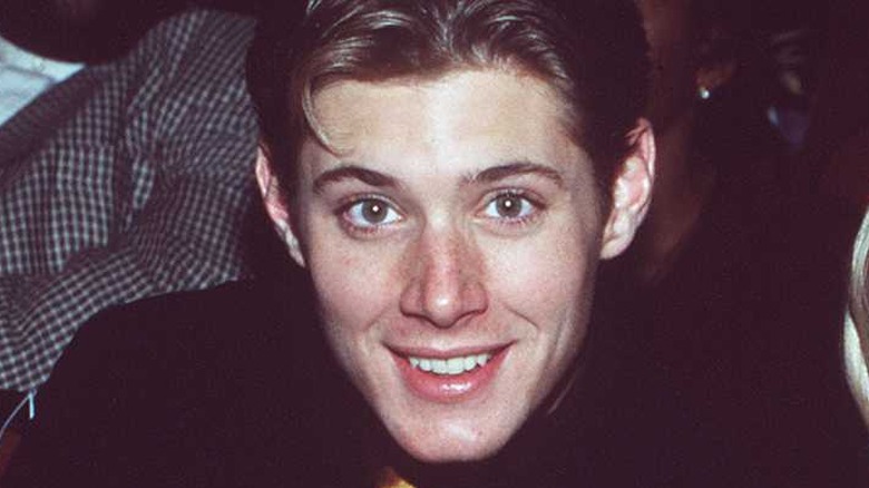 Jensen Ackles posing and smiling