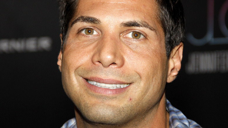 Joe Francis smiling oddly