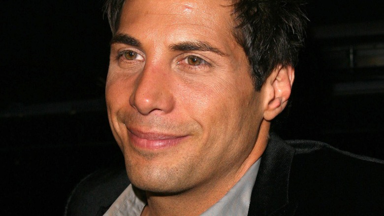 Joe Francis with thin smile