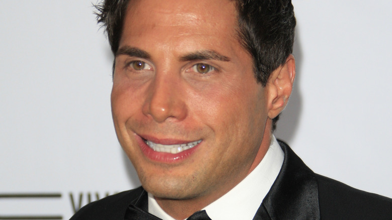 Joe Francis in a black tie