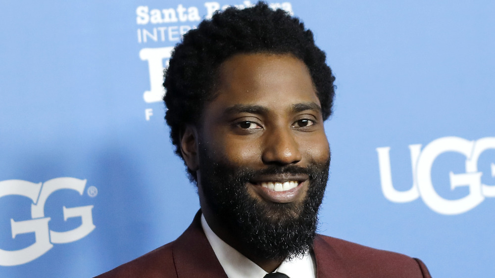 John David Washington smiling