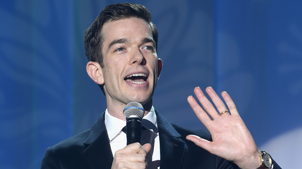 John Mulaney speaking at an event