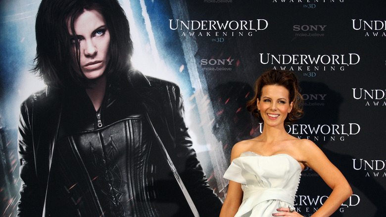 Kate Beckinsale at an event, posing