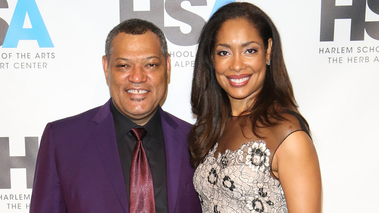 Laurence Fishburne and Gina Torres smiling