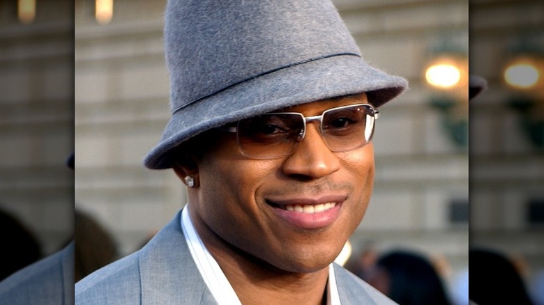 LL Cool J wearing a gray hat