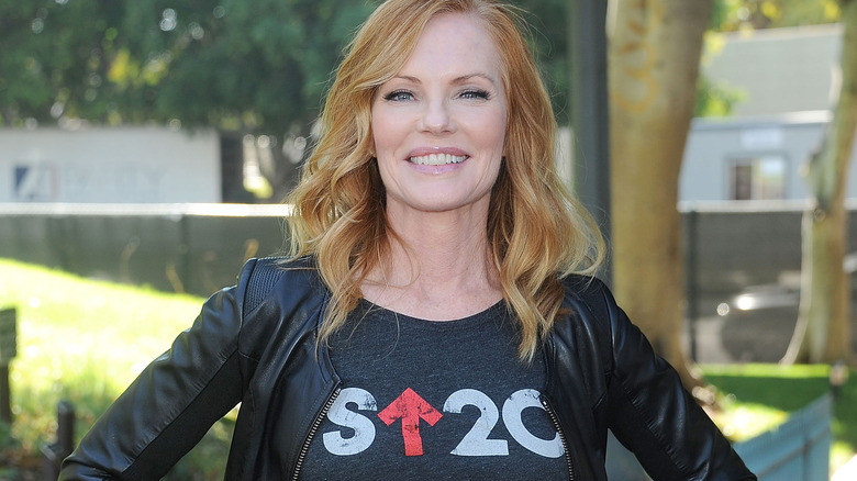 Marg Helgenberger wearing black jacket