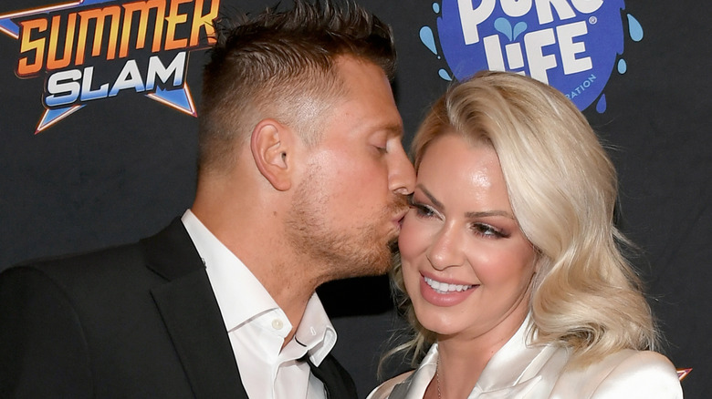 Mike The Miz Mizanin kissing Maryse Mizanin