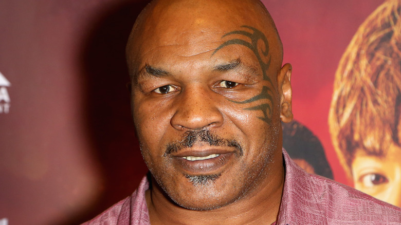 Mike Tyson wearing purple