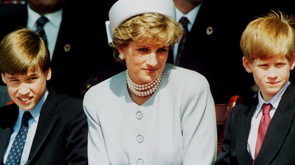 Prince Harry, Princess Diana, and Prince William at an event