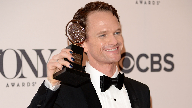 Neil Patrick Harris with a Tony Award