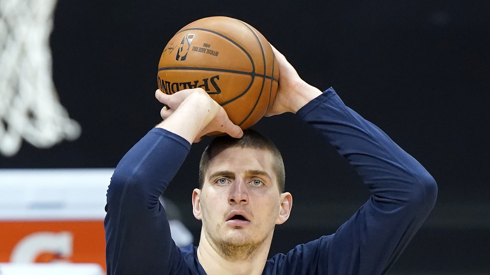 Nikola Jokic playing basketball for the Denver Nuggets