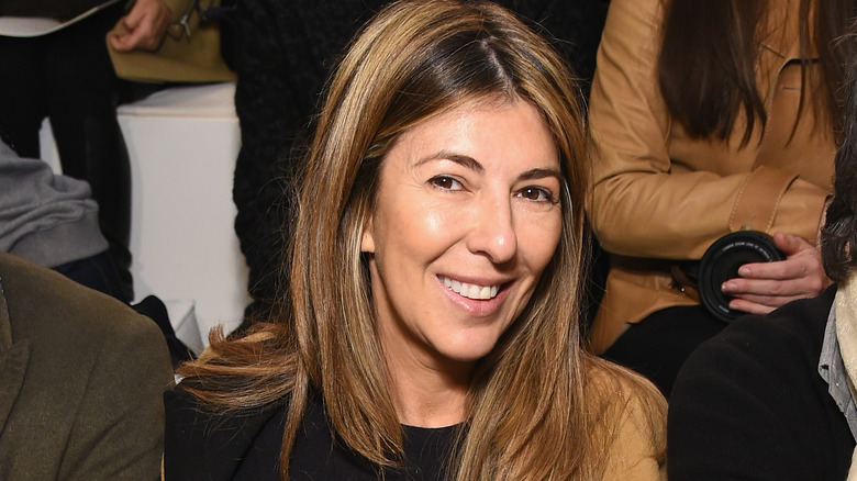 Nina Garcia in black and camel