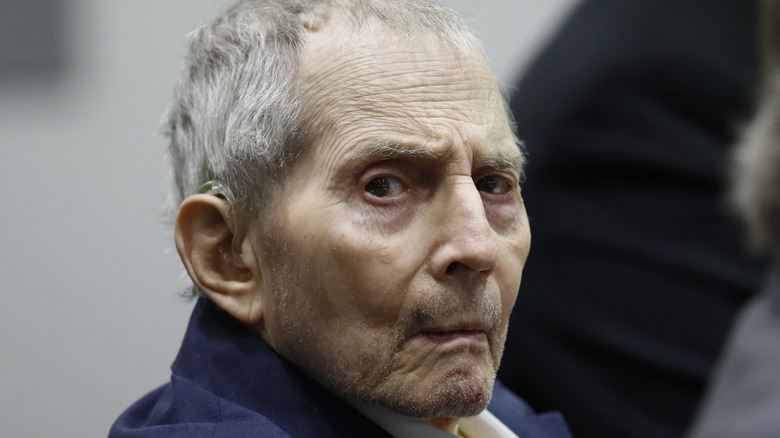 Robert Durst scowling in court