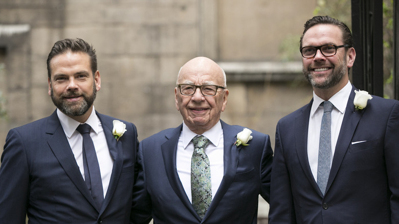 Lachlan Murdoch, Rupert Murdoch, James Murdoch posing