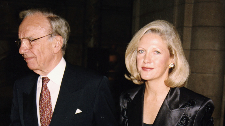 Rupert Murdoch and Anna Mann walking