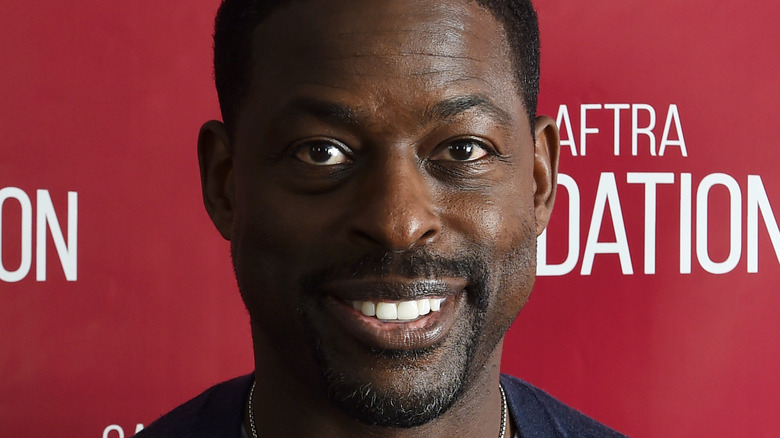 Sterling K. Brown wearing a cardigan 