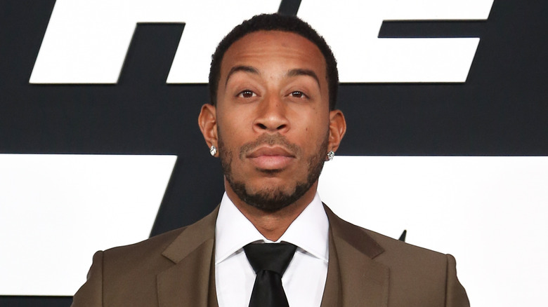 Ludacris raising his eyebrow slightly