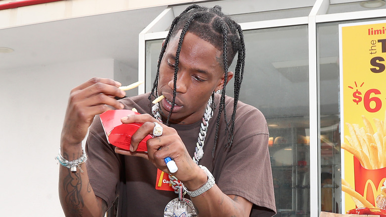 Travis Scott eating fries