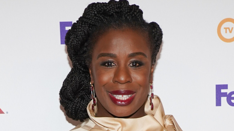 Uzo Aduba wearing jeweled earrings