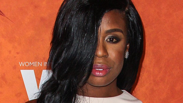 Uzo Aduba with her hair covering an eye