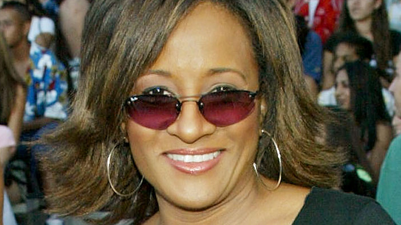 Wanda Sykes wearing pink tinted glasses