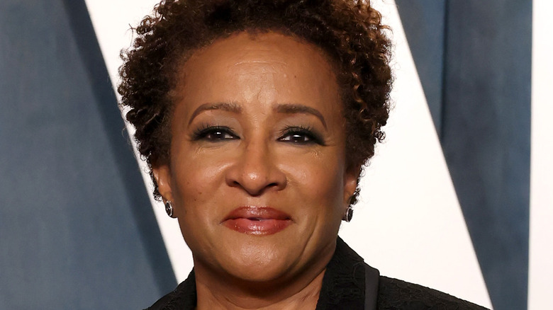 Wanda Sykes wearing all black, posing