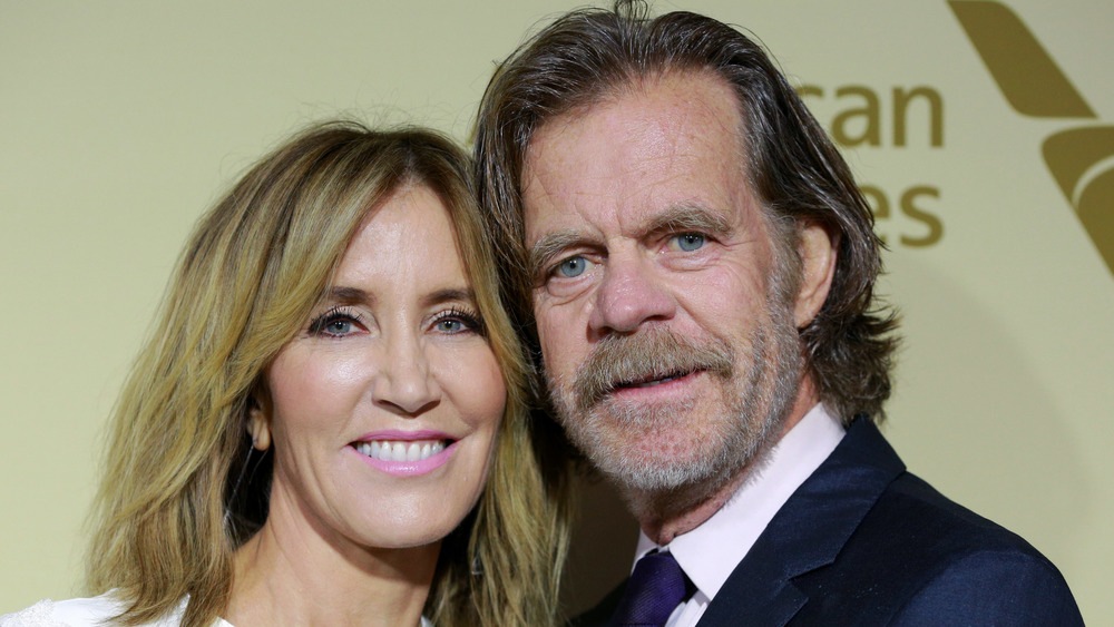 Felicity Huffman and William H. Macy smiling