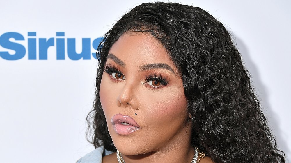 Here's How Plastic Surgery Damaged Lil Kim's Career