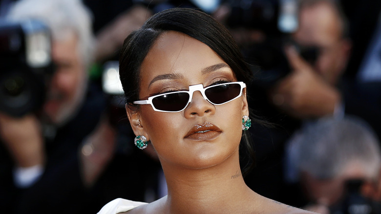 Rihanna posing with sunglasses