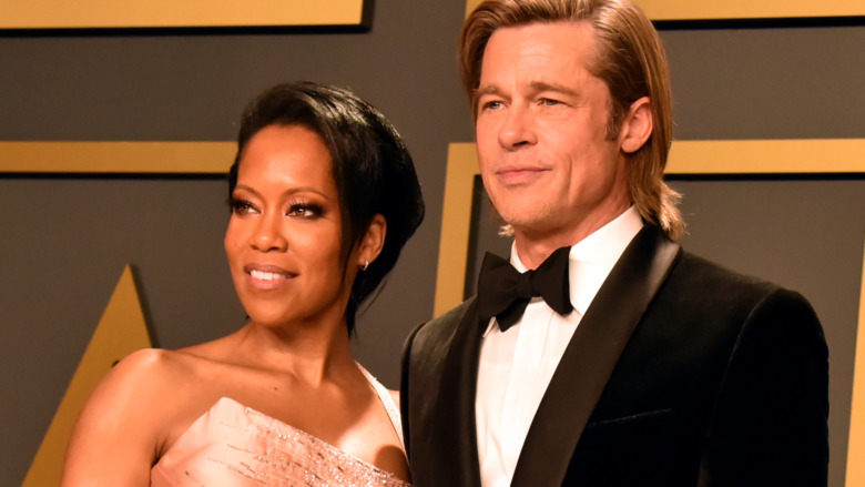 Regina King and Brad Pitt posing at the 2020 Academy Awards