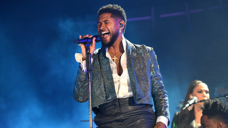 Usher performing on stage