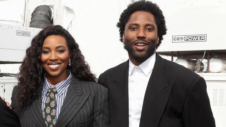 Olivia Washington and John David Washington, both smiling