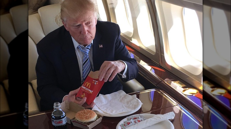 Donald Trump eating McDonalds burger and fries