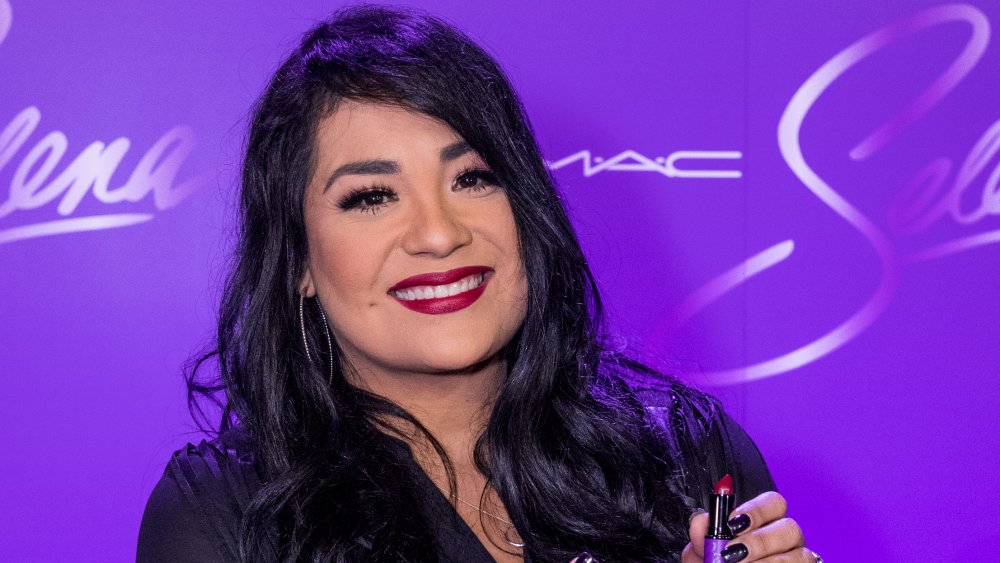 Suzette Quintanilla with lipstick in hand