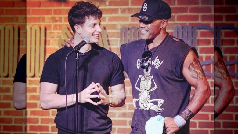 Matt Rife and Shemar Moore laughing onstage