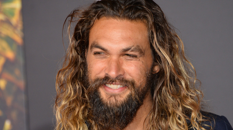 jason momoa long hair beard smiling