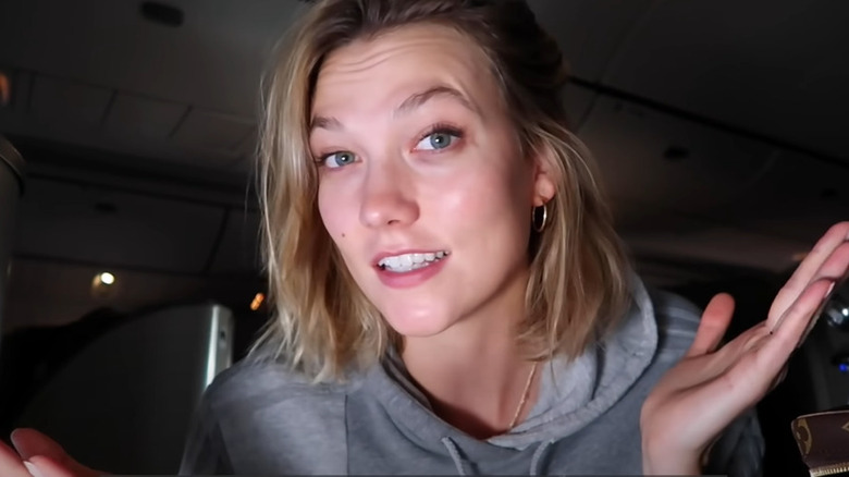 Karlie Kloss wearing a hoodie