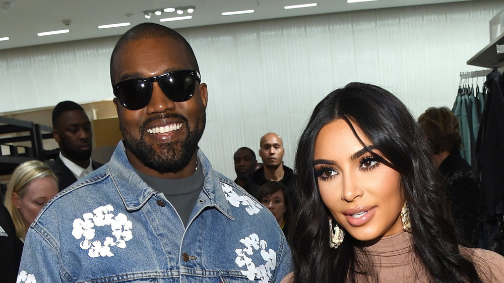 Kim Kardashian and Kanye West smiling