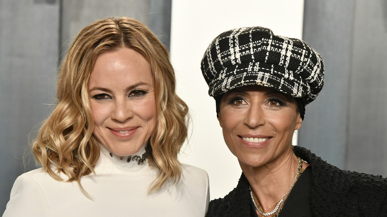 Maria Bello and Dominique Crenn smiling at an event