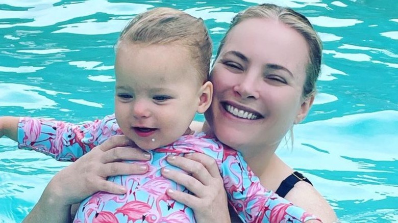 Meghan McCain swimming with her daughter