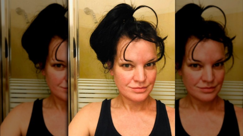 Pauley Perrette with hair up and no makep