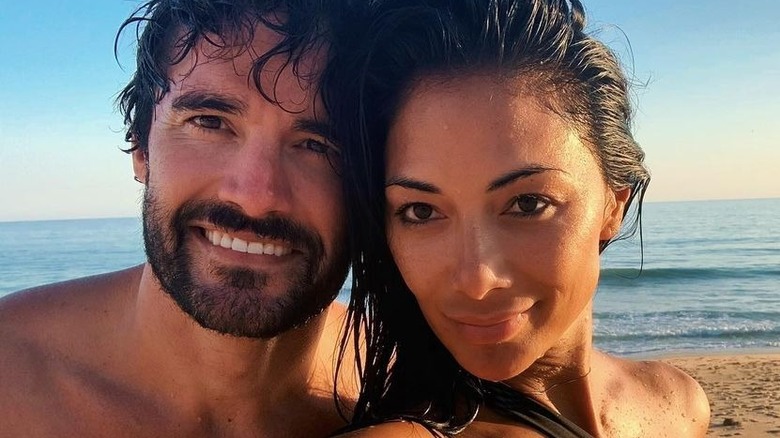 Nicole Scherzinger with Thom Evans at the beach